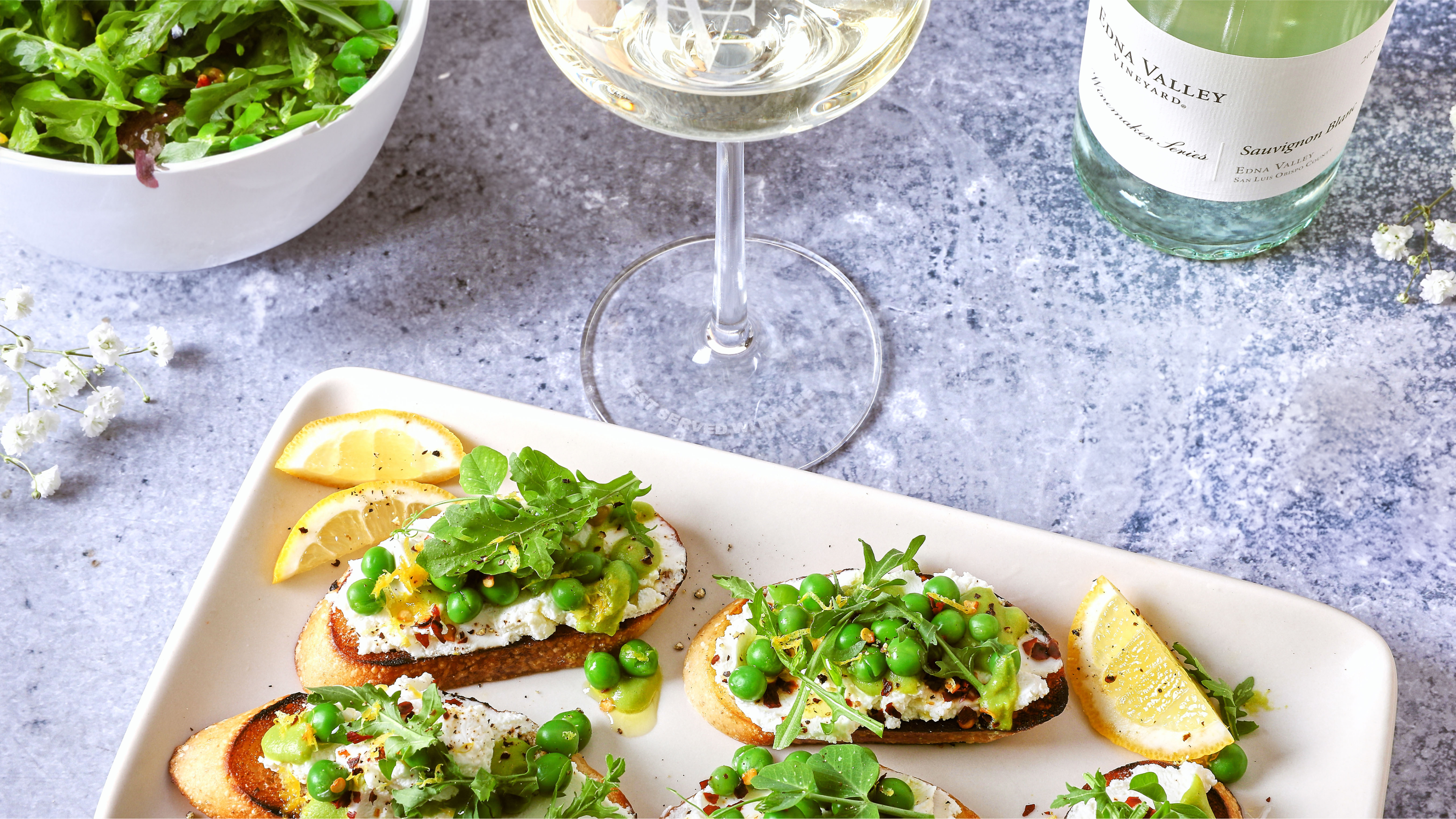 Crostini with Whipped Ch&egrave;vre, Ricotta, and Lemony Pea Pur&eacute;